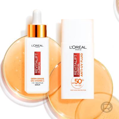 L&#039;Oréal Paris Revitalift Clinical Pure 12% Vitamin C Poklon set serum Revitalift Clinical Vitamin C Serum 30 ml + dnevna krema za lice Revitalift Clinical Vitamin C Anti-UV Fluid SPF50 50 ml